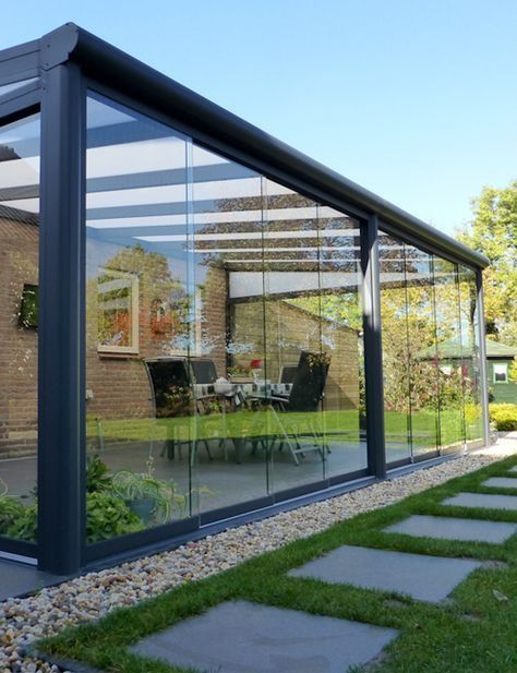 Cierre de terraza con sistema de vidrio plegable en Lo Barnechea